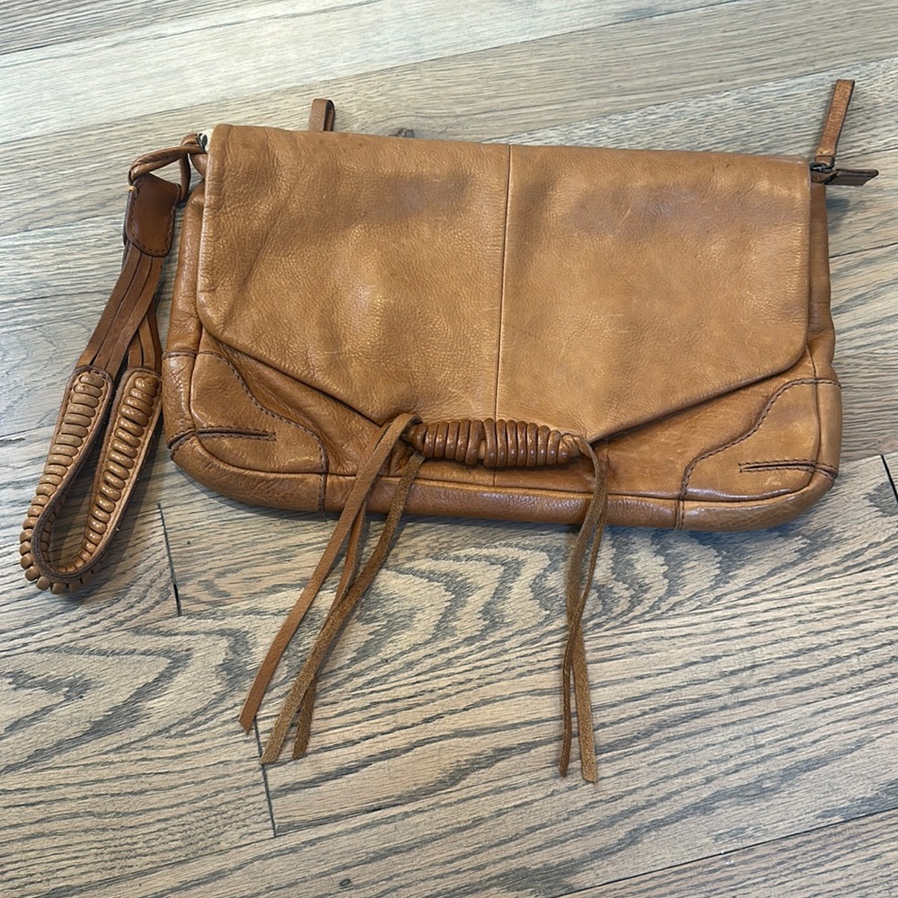 Brown leather clutch